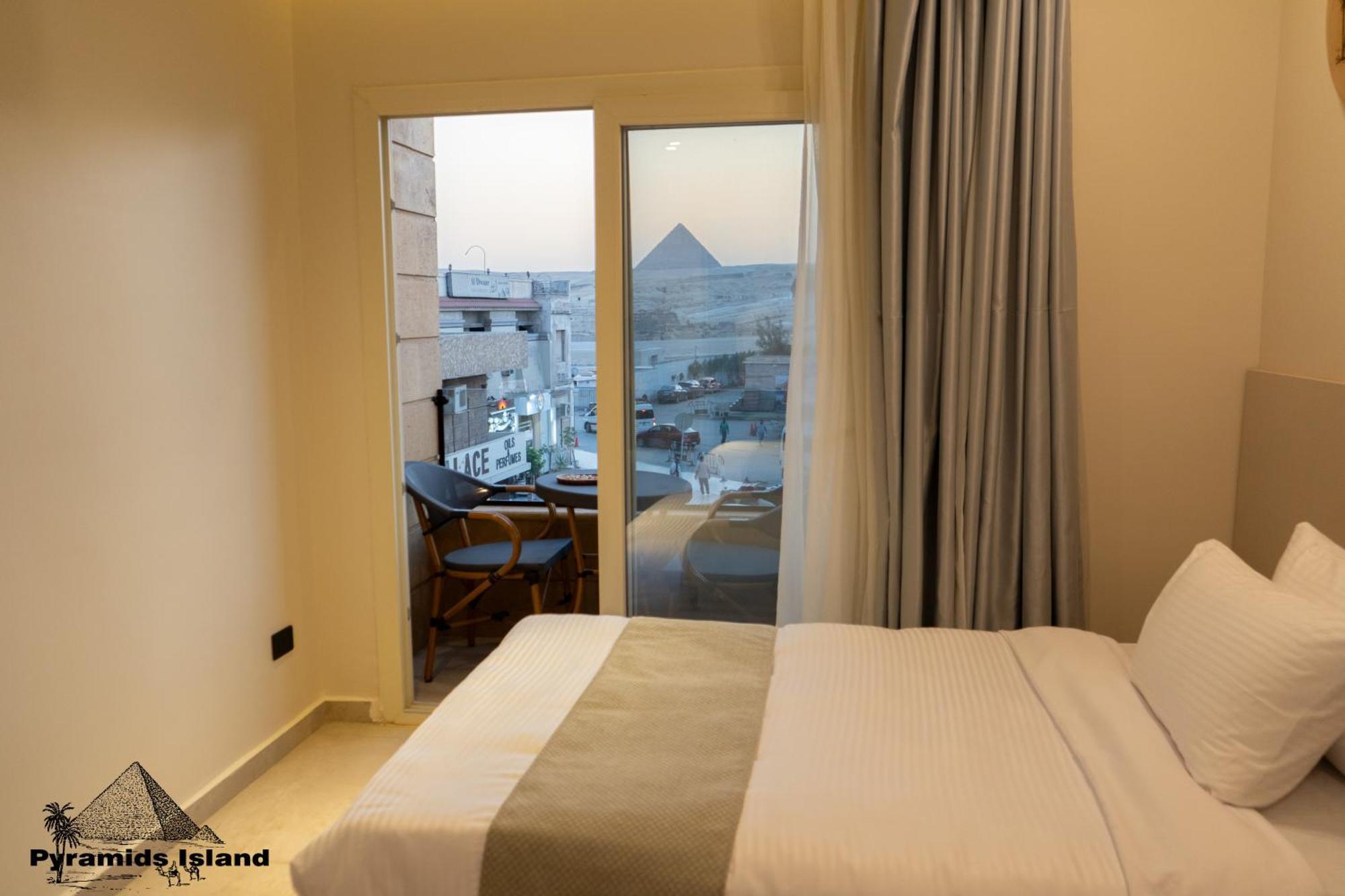Pyramids Island Acomodação com café da manhã Kafrat al Jabal Exterior foto