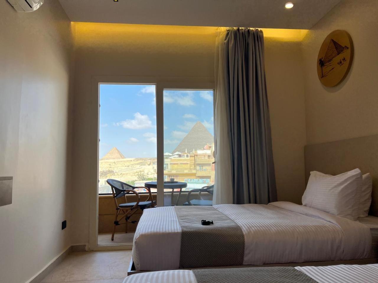 Pyramids Island Acomodação com café da manhã Kafrat al Jabal Exterior foto