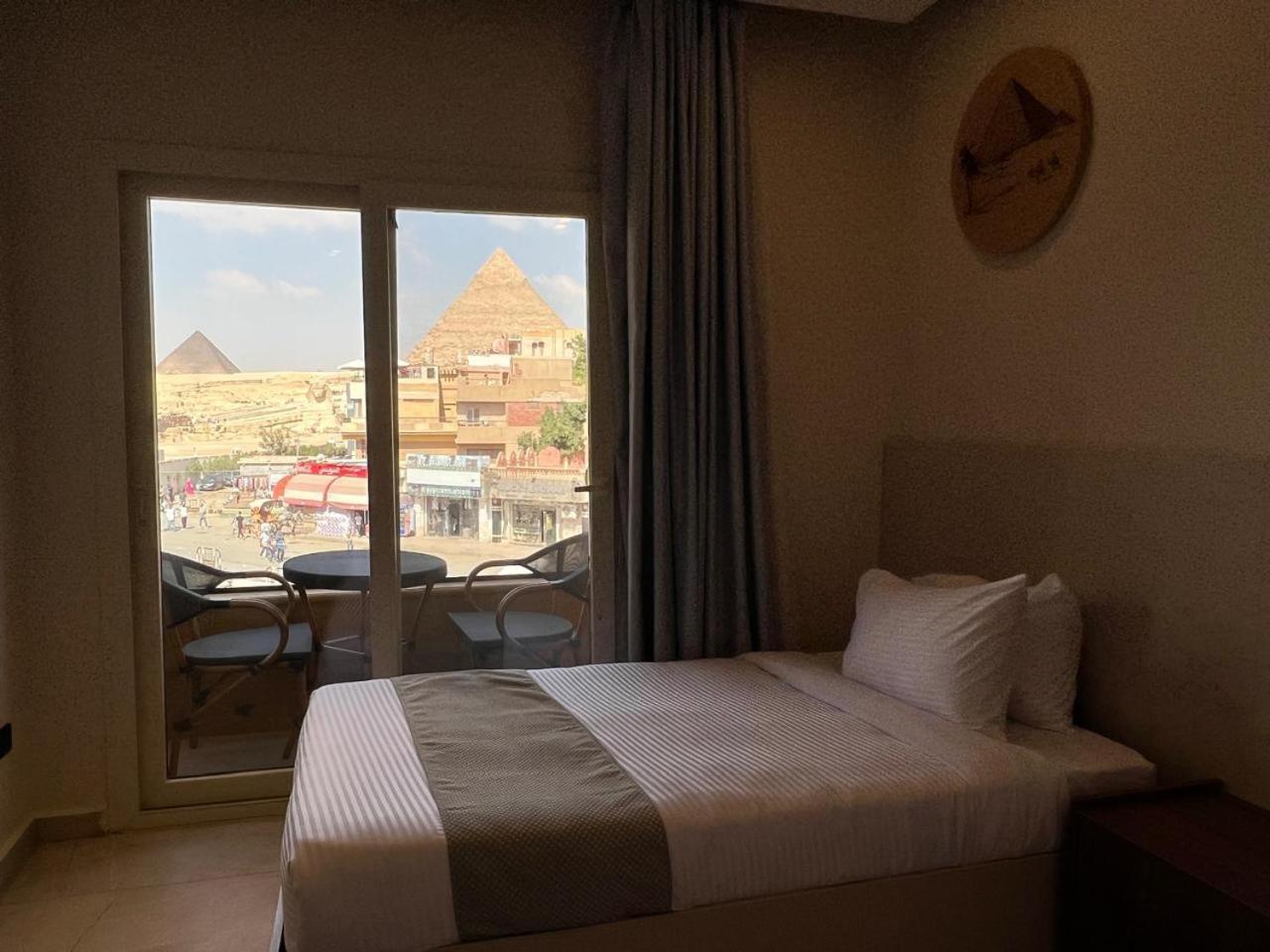 Pyramids Island Acomodação com café da manhã Kafrat al Jabal Exterior foto